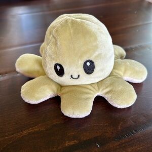 Reversible octopus plush happy/angry green tan